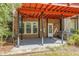 Covered brick patio with metal supports and small backyard at 2827 Overlook Ne Trce, Atlanta, GA 30324