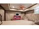 Finished basement featuring carpeted floors, tv, and bonus space at 4030 Palisades Main Nw, Kennesaw, GA 30144