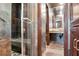 Modern bathroom featuring glass shower with stone tile and a stone vessel sink at 4030 Palisades Main Nw, Kennesaw, GA 30144
