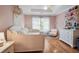 Bright bedroom with daybed, large window, and playful decor at 4030 Palisades Main Nw, Kennesaw, GA 30144
