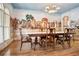 Elegant dining room features hardwood floors and charming mural on the walls at 4030 Palisades Main Nw, Kennesaw, GA 30144