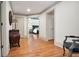 Hallway with hardwood floors, detailed trim, and views into the bedroom at 4030 Palisades Main Nw, Kennesaw, GA 30144