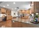 Modern kitchen featuring stainless steel appliances, custom cabinetry, and granite countertops at 4030 Palisades Main Nw, Kennesaw, GA 30144