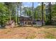 Charming two-story home with a double door garage, nestled in a lush, wooded lot at 4232 Rue Saint Dominique, Stone Mountain, GA 30083