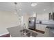 Bright kitchen featuring stainless appliances and light gray countertops at 4232 Rue Saint Dominique, Stone Mountain, GA 30083