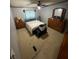 Simple bedroom with bed, nightstand, and dresser, offering cozy living space at 6650 George Ct, Cumming, GA 30041