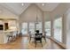 Charming breakfast nook with hardwood floors, pendant lighting, and natural light at 7050 Redcliff Ct, Suwanee, GA 30024