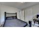 Bedroom featuring a bed and closet, perfect for a home office or study area at 1132 Owen Cir, Sugar Hill, GA 30518