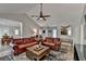 Bright and airy living room with vaulted ceilings and a view of the dining area at 1132 Owen Cir, Sugar Hill, GA 30518