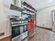 Kitchen featuring stainless steel appliances including range, microwave, and cabinets at 1527 Keeter Rd, Canton, GA 30114