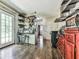Functional kitchen with stainless steel appliances, dark wood floors, and a convenient breakfast bar at 1527 Keeter Rd, Canton, GA 30114