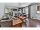 Comfortable living room featuring hardwood floors, neutral walls, and natural light from the window at 1527 Keeter Rd, Canton, GA 30114