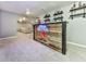 Finished basement bar features rustic wood design, shelving, and neon Michelob Ultra sign at 1017 Fairway Valley Dr, Woodstock, GA 30189