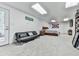 Large finished basement bedroom offers a seating area and ample space at 1017 Fairway Valley Dr, Woodstock, GA 30189