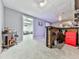 Finished basement featuring a bar area, red mini-fridge, and an open doorway at 1017 Fairway Valley Dr, Woodstock, GA 30189