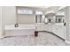 Bathroom featuring a soaking tub, white cabinetry, and tile floors at 1017 Fairway Valley Dr, Woodstock, GA 30189