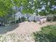 Charming home features stone accents, manicured landscaping, and a neatly maintained lawn at 1017 Fairway Valley Dr, Woodstock, GA 30189