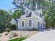 Two-story home featuring a spacious driveway and an attached two-car garage at 1017 Fairway Valley Dr, Woodstock, GA 30189