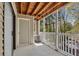 Outdoor balcony space with white railings, a view of nature, and outdoor storage at 110 Barrington Hills Dr # 110, Atlanta, GA 30350