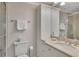 Well-maintained bathroom featuring a built-in cabinet, vanity, and glass door shower at 110 Barrington Hills Dr # 110, Atlanta, GA 30350