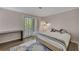 Inviting bedroom with sliding door to the outside, and desk area at 110 Barrington Hills Dr # 110, Atlanta, GA 30350