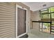 Apartment front door with a doormat, and a view of the exterior stairway at 110 Barrington Hills Dr # 110, Atlanta, GA 30350