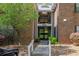 Apartment entrance with a sidewalk and a view of the building's exterior at 110 Barrington Hills Dr # 110, Atlanta, GA 30350