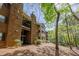 Brick condos with balconies and lush landscaping for a serene and inviting community feel at 110 Barrington Hills Dr # 110, Atlanta, GA 30350