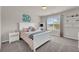 Comfortable bedroom with white furniture, carpeted floors, and good natural light at 1304 Slate Bend Dr, Dacula, GA 30019