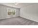 Bright secondary bedroom with neutral paint and natural light at 1304 Slate Bend Dr, Dacula, GA 30019