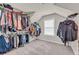 Ample storage space in this walk-in closet at 1304 Slate Bend Dr, Dacula, GA 30019