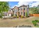 Spacious two-story home with a three-car garage and well-maintained lawn at 1304 Slate Bend Dr, Dacula, GA 30019