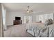 Relax in this expansive main bedroom that includes an ensuite bath, a walk-in closet and an entry to the upper level at 1304 Slate Bend Dr, Dacula, GA 30019