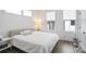 Bedroom features a cozy bed with three windows providing natural light at 200 Chestnut Cir, Atlanta, GA 30342