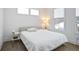 Bedroom features a cozy bed with three windows providing natural light at 200 Chestnut Cir, Atlanta, GA 30342