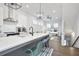 Spacious kitchen flows into living area, featuring a large island, and modern appliances at 200 Chestnut Cir, Atlanta, GA 30342