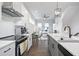 Open concept kitchen with an island, seamlessly connecting to the stylish living area at 200 Chestnut Cir, Atlanta, GA 30342