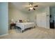 Spacious bedroom with comfortable bed, double closet and neutral color scheme, perfect for relaxation at 3818 Bay Forest Way, Loganville, GA 30052