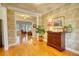 Inviting foyer features hardwood floors, decorative wall textures, and an open view into the living spaces at 3818 Bay Forest Way, Loganville, GA 30052
