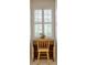 Cozy nook featuring a small desk with a window that lets in abundant light and a decorative flower piece at 3818 Bay Forest Way, Loganville, GA 30052