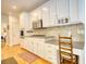 Bright kitchen featuring white cabinets, stainless steel appliances, and tile backsplash at 3818 Bay Forest Way, Loganville, GA 30052