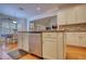 Well-lit kitchen offers stainless steel appliances, light-colored cabinets, and an open layout at 3818 Bay Forest Way, Loganville, GA 30052