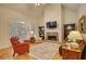 Inviting living room with hardwood floors, fireplace, and comfortable seating at 3818 Bay Forest Way, Loganville, GA 30052