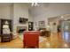 Spacious living room featuring a fireplace, hardwood floors, and an open floor plan at 3818 Bay Forest Way, Loganville, GA 30052