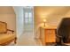 Attic office nook featuring a desk, chair and neutral carpeting at 3818 Bay Forest Way, Loganville, GA 30052