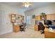 Bright office space with built-in shelving, wood desks, and natural light, ideal for a productive work environment at 3818 Bay Forest Way, Loganville, GA 30052