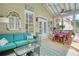 Inviting screened patio with comfortable seating and dining area, perfect for outdoor relaxation at 3818 Bay Forest Way, Loganville, GA 30052