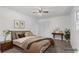 Staged bedroom featuring closet, ceiling fan and decorative furniture at 46 Hawkins Store Nw Rd, Kennesaw, GA 30144