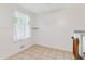 Bright eat-in kitchen boasts tile floors, open space, and stairway access at 46 Hawkins Store Nw Rd, Kennesaw, GA 30144