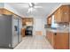 Functional kitchen with stainless steel appliances, tile backsplash, and ample cabinet space at 46 Hawkins Store Nw Rd, Kennesaw, GA 30144
